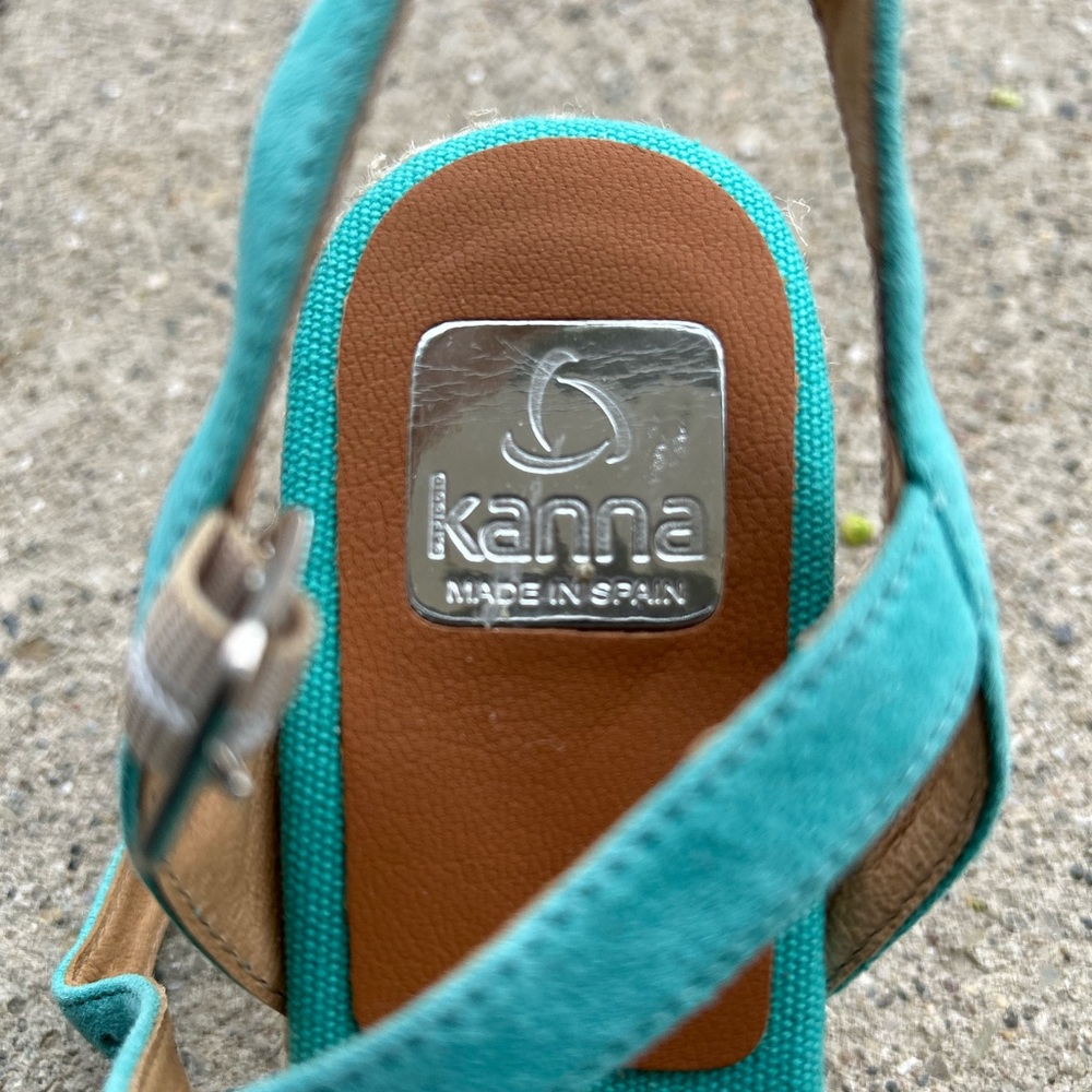 Turquoise wedge sandals, size 40, made in Spain with clasp around ankles.